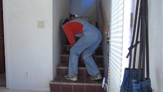 Moving a wood stove  Up a windy stairway with one guy [upl. by Liesa]