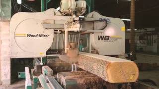 WoodMizer WB2000 wide band sawmill in action [upl. by Idzik]