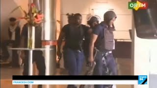 Mali attack first images released of police besieging islamist gunmen at Radisson hotel [upl. by Suoirtemed]