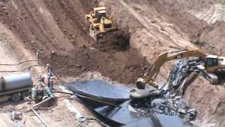 EnCana Buries Hydraulic Fracturing Pit Sludge in Unlined Pit May 14 2009 [upl. by Carmencita]