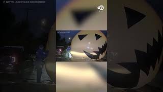 Giant pumpkin swallows Ohio police officer [upl. by Mina]