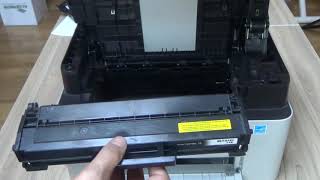 Samsung Xpress M2070 M2070W M2070F M2070FW  Replacing the Toner Cartridge [upl. by Sufur659]