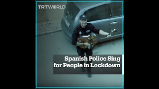 Police in Spain sing for residents in lockdown [upl. by Aliekat]