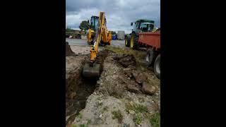 JCB 4cx digging footings and loading herbst dump trailer and John Deere 6610 Derbyshire [upl. by Boice]