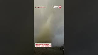 Dust tornado swirls lightning bolts strike near road in Sharjah [upl. by Sueahccaz]