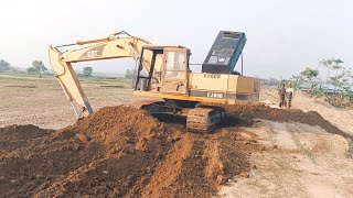 CAT E200B excavator working road project [upl. by Eelnyl949]