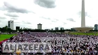 Muslims in Indonesia Protest Over Christian Governor [upl. by Charters130]