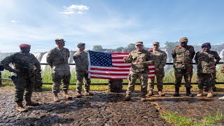 United States Army Mounts a USA Flag at the Victoria falls in Zambia [upl. by Laehcym]