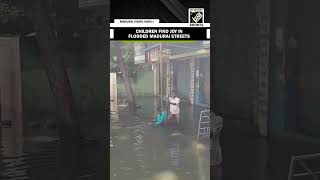 Tamil Nadu Streets of Madurai waterlogged children enjoy [upl. by Dupuy]