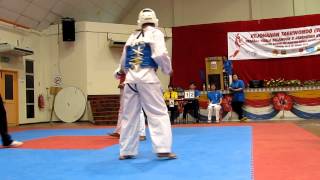 Taekwondo junior Sparring  White Belt Vs yellow belt round 1 [upl. by Uttasta]