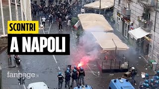 NapoliEintracht scontri fra tifosi sassaiole lancio di oggetti e auto incendiate [upl. by Akinot]