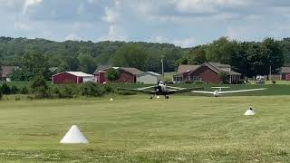 Tow plane taking off with a glider on an all grass runway [upl. by Nevyar]