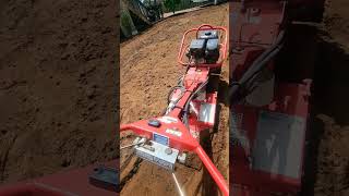 Operating Barreto tiller one handed tiller landscaping dirt pdx onehanded barreto sodinstall [upl. by Allemap]