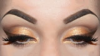 Trucco occhi oro e marrone  Beautydea [upl. by Yelekalb]