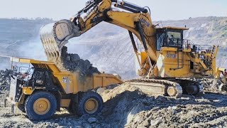 Caterpillar 6030B excavator loading and cat 777 truck lifting power [upl. by Ellehcor]