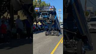 GAS HOPPING LOWRIDER 64 Chevrolet Impala hitting back bumper on the Blvd in Los Angeles California [upl. by Yrrag489]