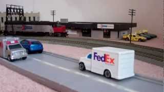 HO Scale Metra Express Train amp An Amtrak Station Stop [upl. by Ednalrim]