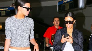 Kim Kardashian And Kendall Jenner Return To LA Looking Fab 2014 [upl. by Nivra267]