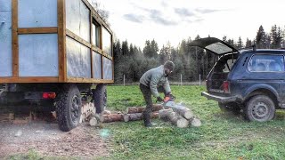 Off Grid life in a TrailerFirewood stockpiling Making a roof to the Shed [upl. by Ahsieken]