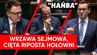 quotHańbaquot Krzyki na przemówieniu Morawieckiego Prześmiewcza riposta Hołowni [upl. by Annaor733]