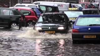 Noodweer zorgt voorwateroverlast in Tilburg [upl. by Auqenehs221]