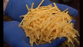 Urschel® Model CCDL cheddar cheese shredding [upl. by Einnahpets]