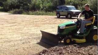 Deere D130 riding mower using Nordic Plow in summer [upl. by Carrillo]