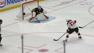 Nico Hischier scores a goal against the Vancouver Canucks [upl. by Anirdnaxela]