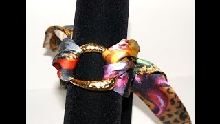 How to wear a silk scarf bracelet  Helen Bellart [upl. by Ailedo511]