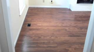 Laminate flooring flowing between rooms without a Tmolding [upl. by Conner]