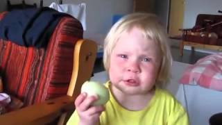 Kid eats onion like an apple [upl. by Sayres]