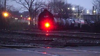 Triple Train Meet at Night Canadian Pacific Train with a DPU Alright Two Big CSX Manifest Train [upl. by Acirederf392]