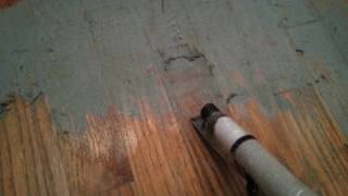 Using paint stripper on painted wood floors removing a couple layers of old latex floor paint [upl. by Eiggam]