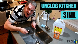 How to unclog a kitchen sink using baking soda and vinegar [upl. by Nosecyrb]