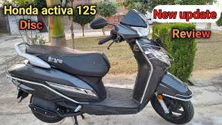 Honda activa 125 new model disk brake all features price mileage details video review [upl. by Oinotna]