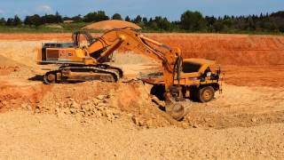 R974B Liebherr loading 770 CAT Valerian [upl. by Linnie223]