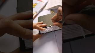 binding a small sketchbook 🪡🧵bookbinding bookbinder easy bookbinding trandingshorts viralsong [upl. by Perrins723]