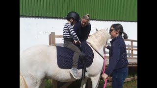 Hippotherapy at Sensational Kids [upl. by Dnomhcir]