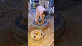 Manual truck tire fitting into Rim with harleywheels rimblades cutoffwheel aluminumwheels [upl. by Proudlove]