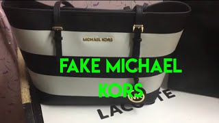 How To Spot Fake Michael Kors BagWOKWOKTV [upl. by Carlita]