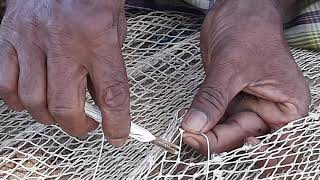 Primative techniques of repairing fishing nets [upl. by Aralk]