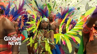 Caribana weekend 2024 Caribbean Carnival parade takes over Toronto [upl. by Hallagan179]