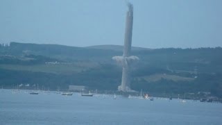 DEMOLITION Inverkip Power Stations chimney brought down with two explosions [upl. by Ognimod]