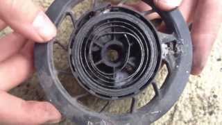 PushMowerRepaircom  Briggs 35HP Recoiling a Starter Spring [upl. by Goodkin]