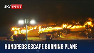 Japan plane fire Passengers evacuated after planes collide at Tokyo airport [upl. by Stevie]