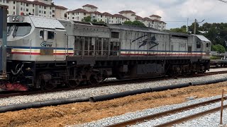 KTMB Class 26106 Tanjung Jara locomotive with container and flatbed wagons arriving from North Port [upl. by Attennyl246]