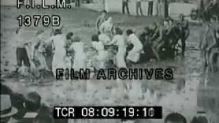 Vintage Mud Fight stock footage  archival footage [upl. by Atsev]