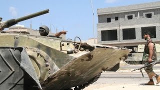 Libya forces press assault on last IS positions in Sirte [upl. by Tiff616]