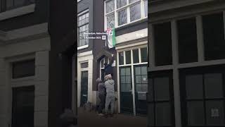 Maccabi Tel Aviv hooligans tear down Palestinian flags from homes in Amsterdam [upl. by Ahsirahc929]