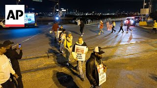 Dockworkers at US ports go on strike over wages and automation [upl. by Layol511]